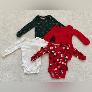 Four newborn sized onesies.  Minimally worn.